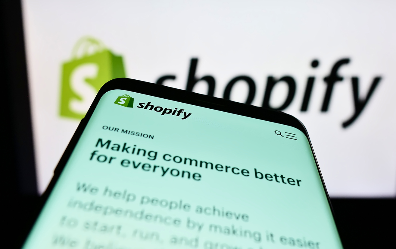 A mobile phone with Shopify details